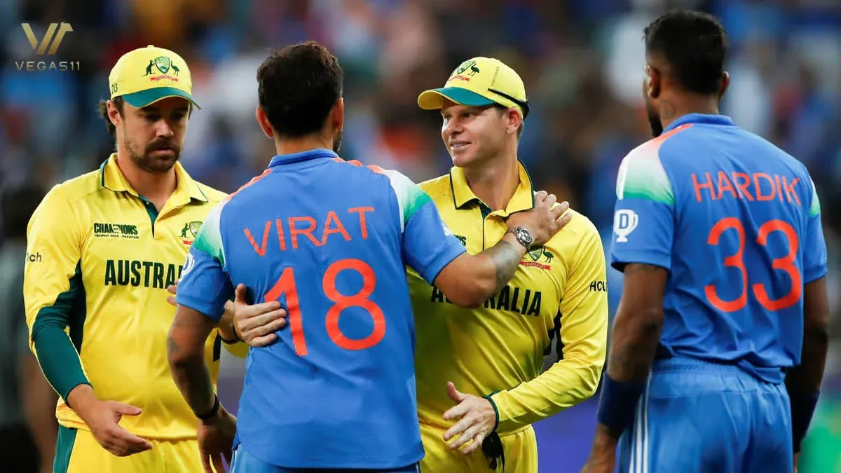 Virat Kohli shares a friendly hug with Steve Smith, with Travis Head and Hardik Pandya stand nearby during India vs Australia pre-match moments.
